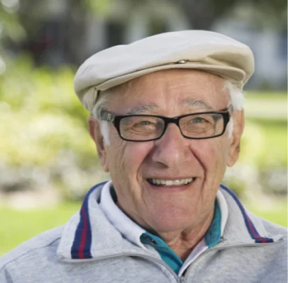 Patient living confidently with implant overdentures